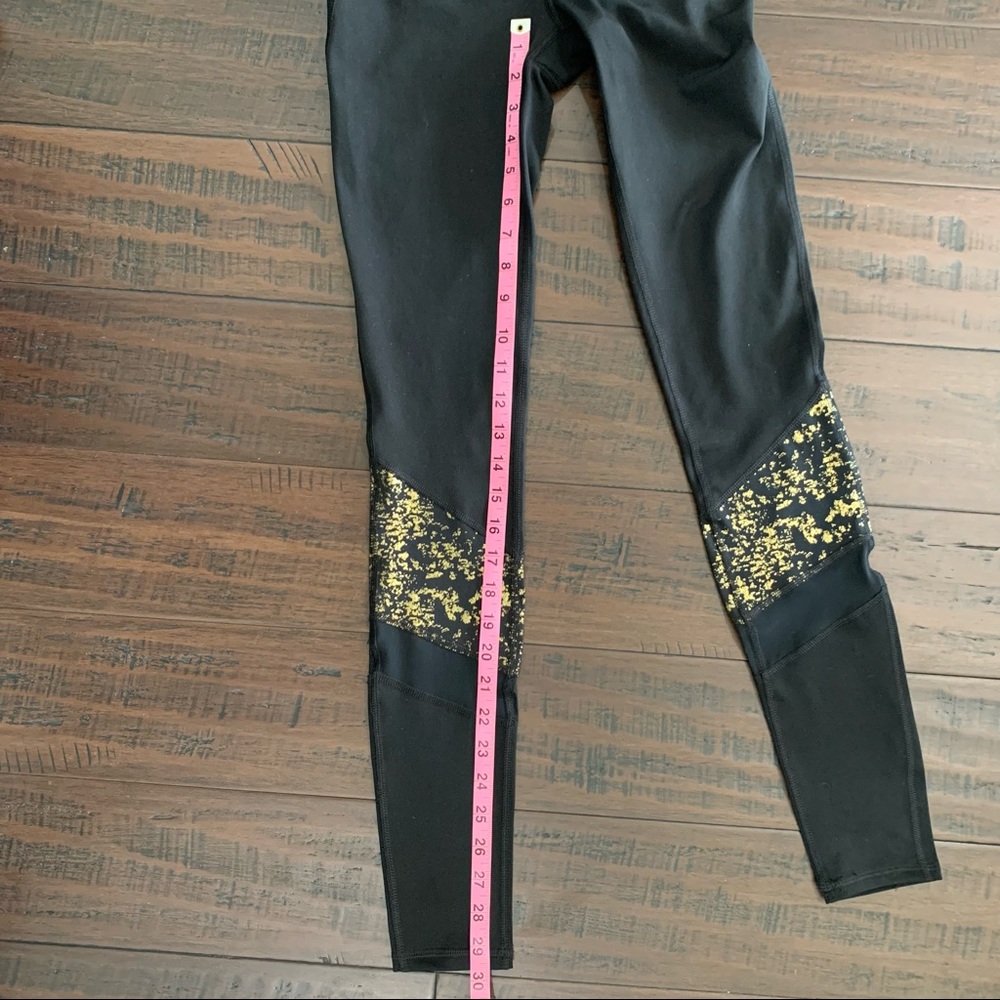 Gaiam Black Leggings with Gold Accent and Mesh Panels - Picture 10 of 10